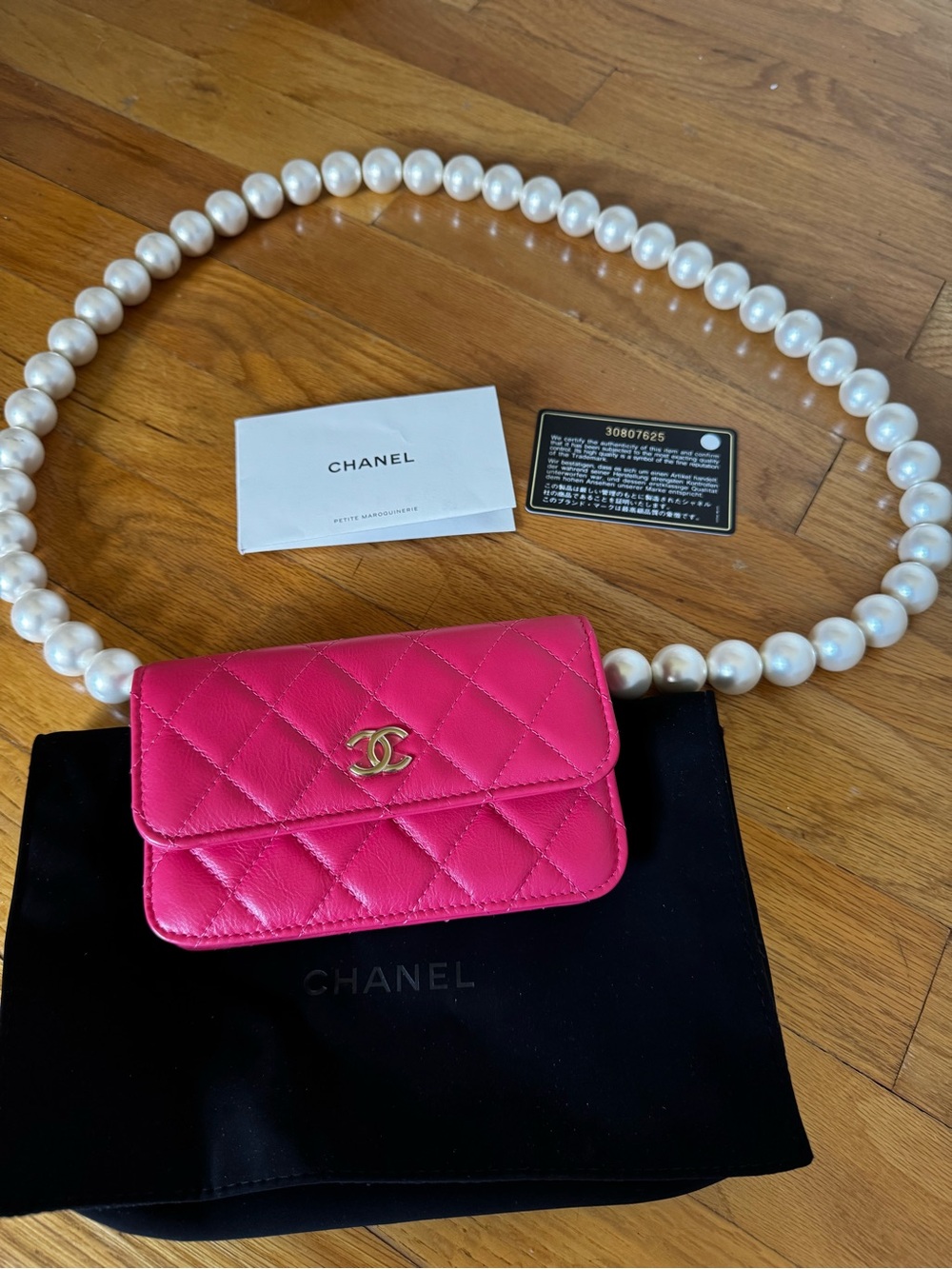 CHANEL Hot Pink Quilted Mini Wallet with Pearl Chain